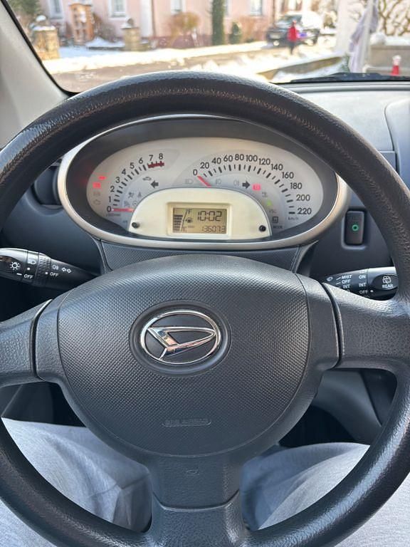 Gebraucht Daihatsu Sirion 69 PS (50 kW) 2010 Schwarz Kleinwagen