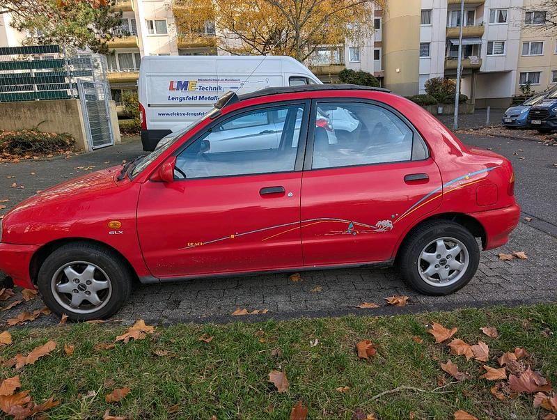 Rot Gebraucht 1994 Mazda 121 Kleinwagen | 2.600 € - Bild 1/4