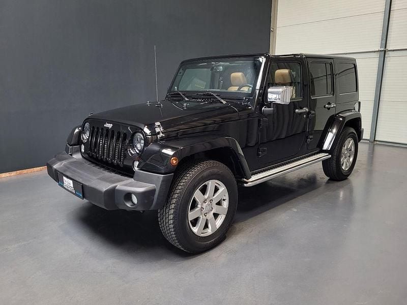 Schwarz Gebraucht 2014 Jeep Wrangler Unlimited Sahara SUV | 28.950 € (Fairer Preis) - Bild 1/4