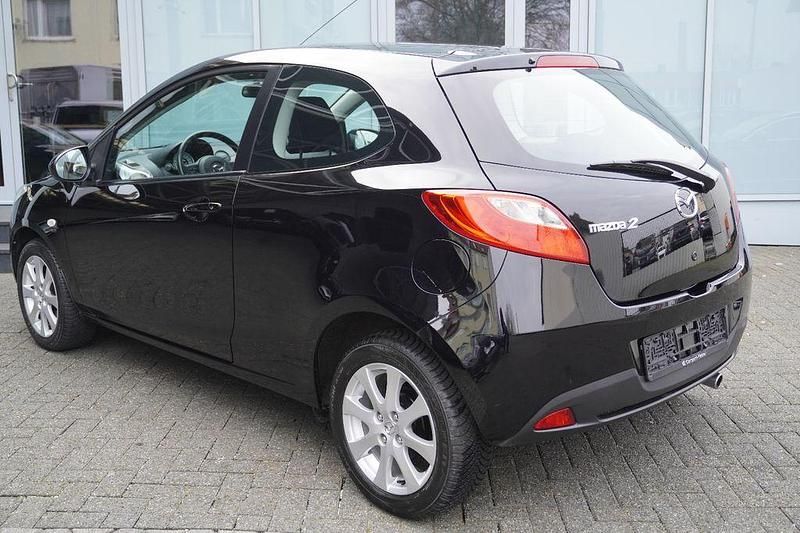 Gebraucht Mazda 2 Inclusive 75 PS (55 kW) 2009 Schwarz Kleinwagen