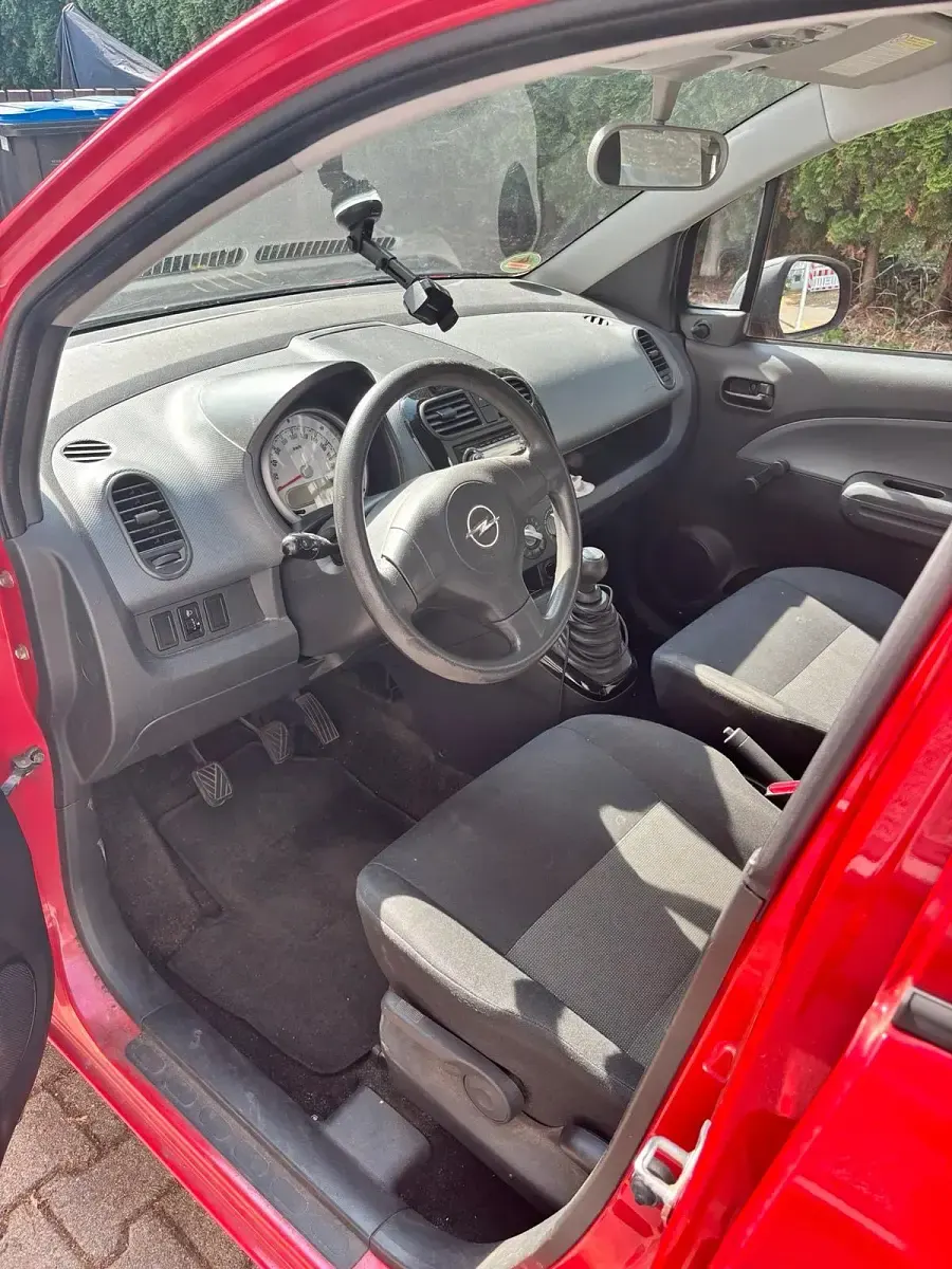 Gebraucht Opel Agila 65 PS (47 kW) 2009 Rot Kleinwagen
