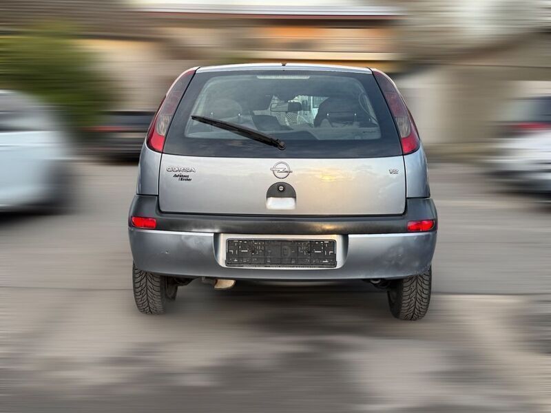 Second-hand Opel Corsa Njoy 75 CP (55 kW) 2003 Argintiu Berlinǎ