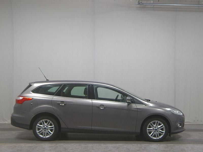 Brisbane braun (met.) Gebraucht 2014 Ford Focus Titanium Kombi | 2.450 € (Superpreis) - Bild 1/4