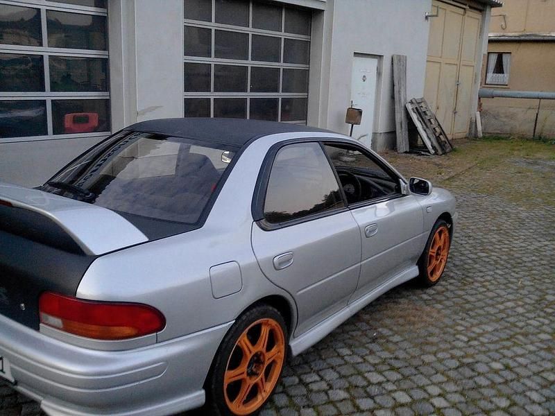 Silber Gebraucht 1996 Subaru WRX Limousine | 7.500 € - Bild 1/4