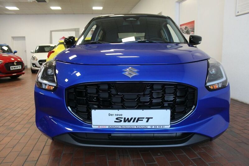 Blau Neu 2024 Suzuki Swift Comfort+ Limousine | 19.250 € - Bild 1/4