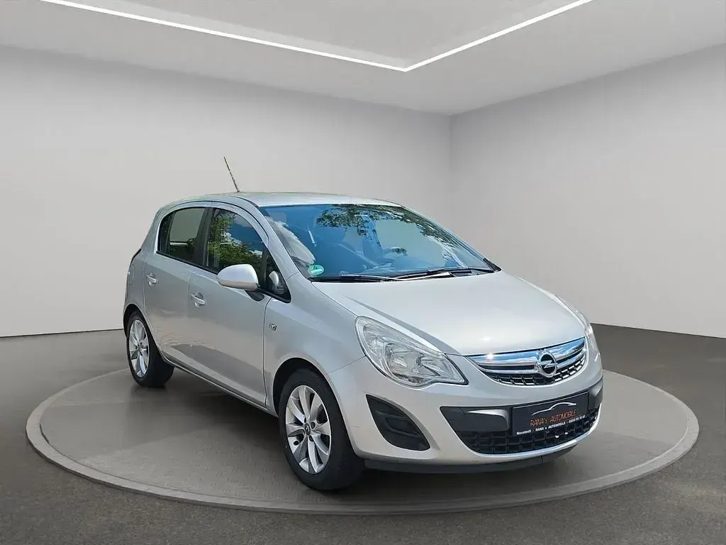 Gebraucht Opel Corsa Active 87 PS (63 kW) 2013 Silber Kleinwagen