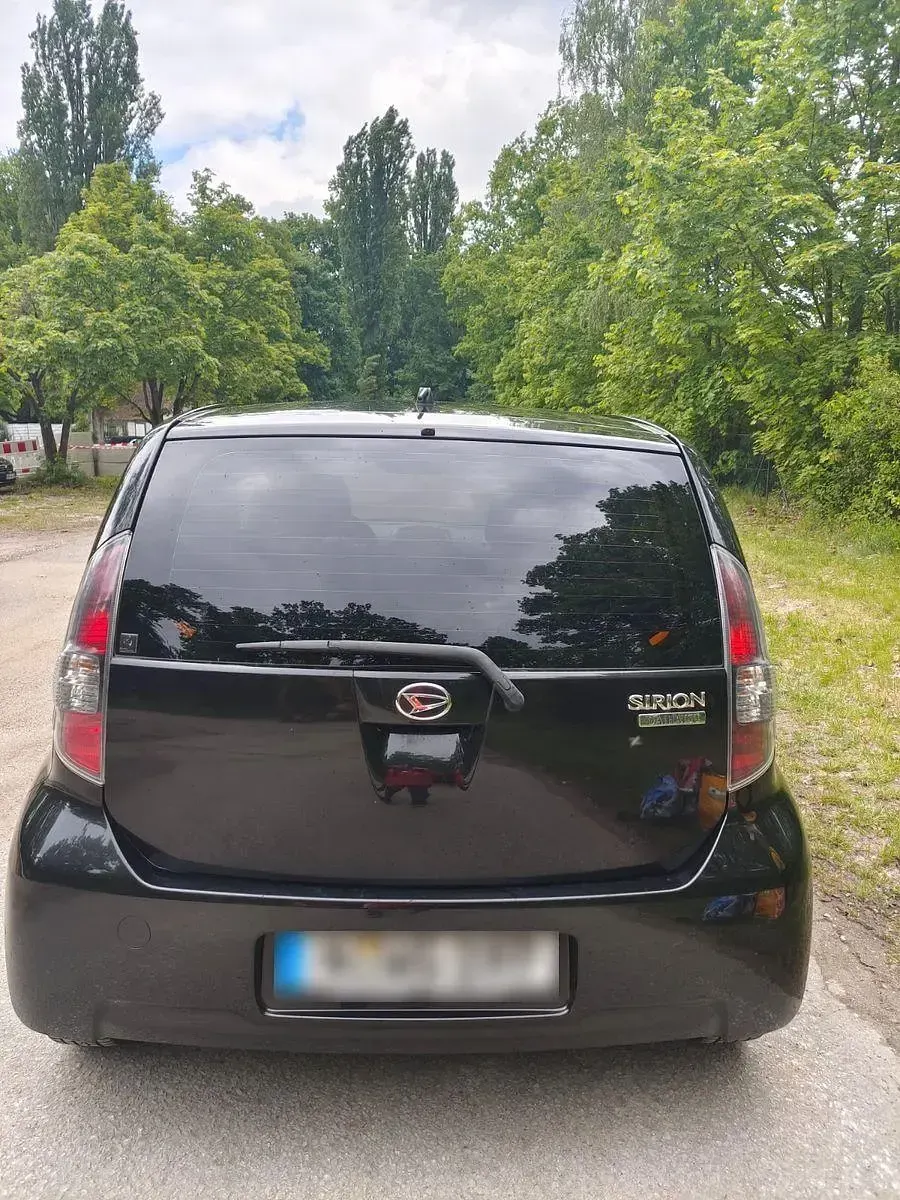 Gebraucht Daihatsu Sirion 91 PS (66 kW) 2008 Schwarz Kleinwagen