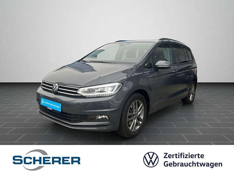 Delfingrau metallic (metallic) Gebraucht 2025 VW Touran Comfortline Van / Kleinbus | 31.900 € (Guter Preis) - Bild 1/4