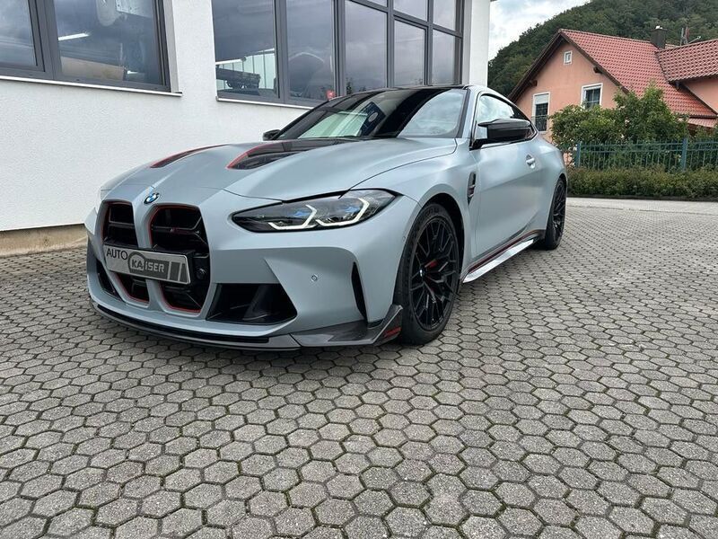 Grau Gebraucht 2022 BMW M4 Performance Coupé | 129.900 € - Bild 1/4