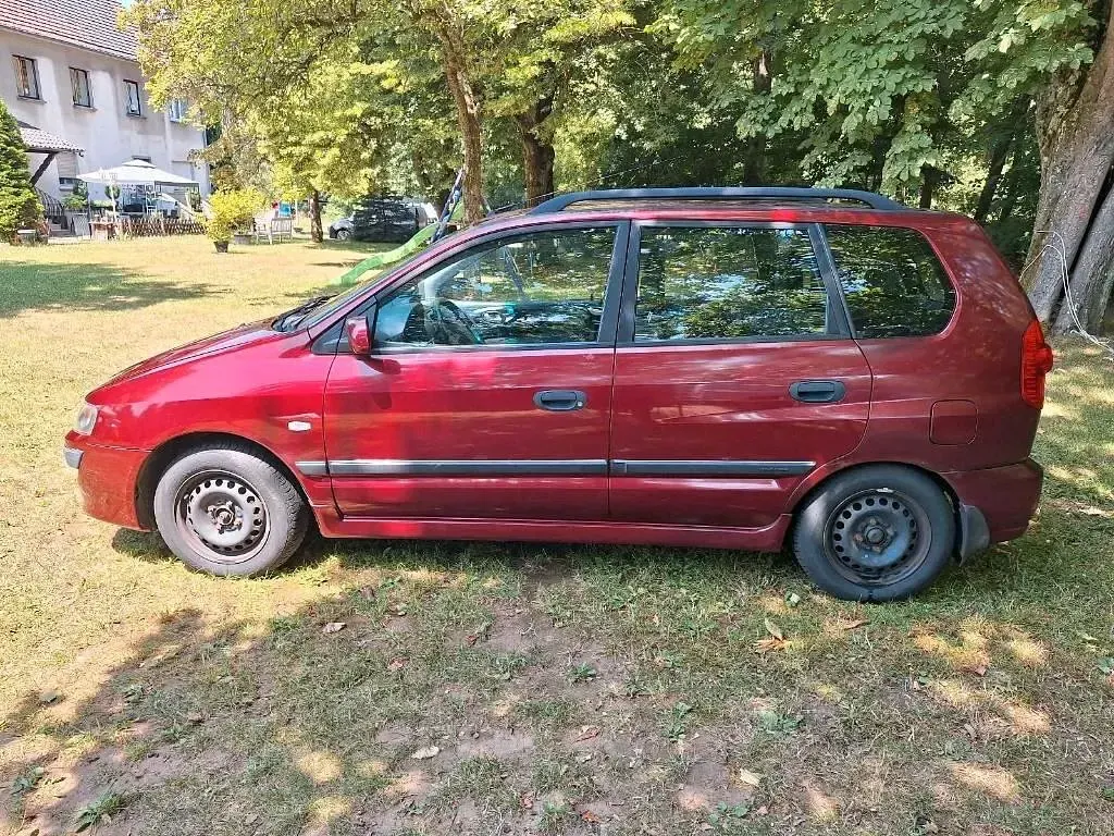 Gebraucht Mitsubishi Space Star 98 PS (72 kW) 2003 Rot Van / Kleinbus