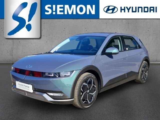 Dunkelgruen Gebraucht 2021 Hyundai Ioniq 5 Dynamiq SUV | 26.930 € (Etwas zu teuer) - Bild 1/4