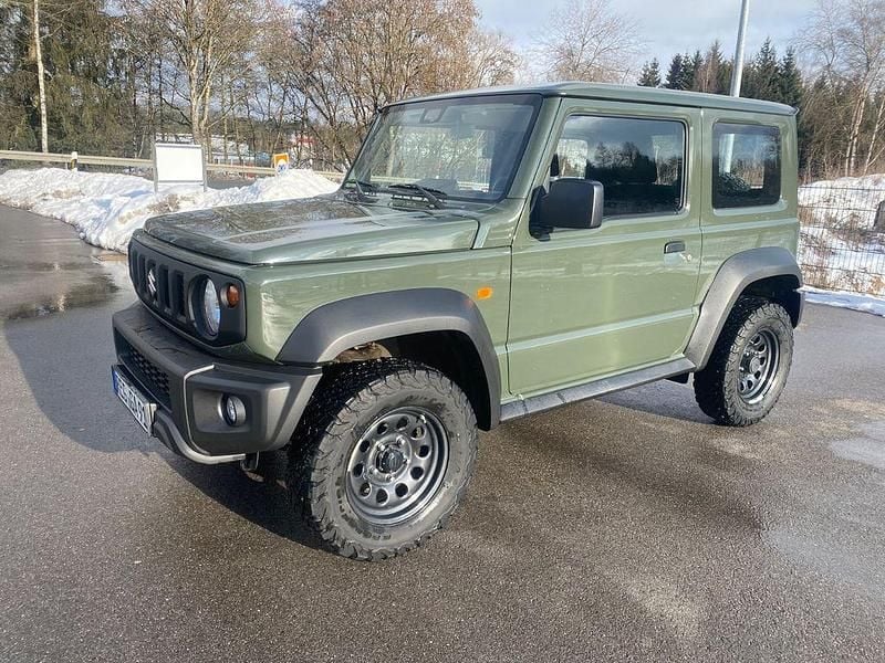Grün Gebraucht 2022 Suzuki Jimny SUV | 26.900 € (Superpreis) - Bild 1/4