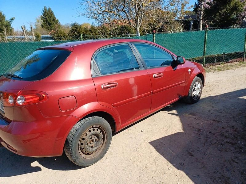 Gebraucht Chevrolet Lacetti SE 69 PS (50 kW) 2007 Rot Limousine