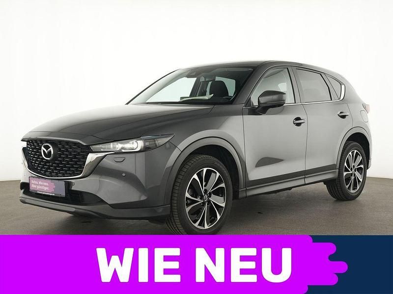 Machine gray Gebraucht 2022 Mazda CX-5 Ad'Vantage SUV | 28.943 € (Fairer Preis) - Bild 1/4