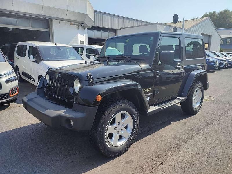 Schwarz Gebraucht 2013 Jeep Wrangler Sahara SUV | 19.999 € (Fairer Preis) - Bild 1/4