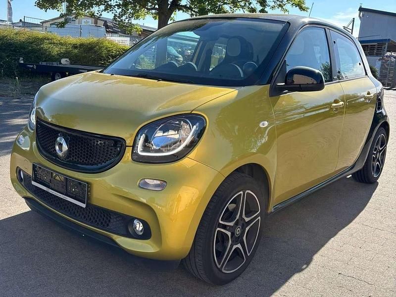Gelb Gebraucht 2015 Smart ForFour Passion Kleinwagen | 6.999 € (Guter Preis) - Bild 1/4