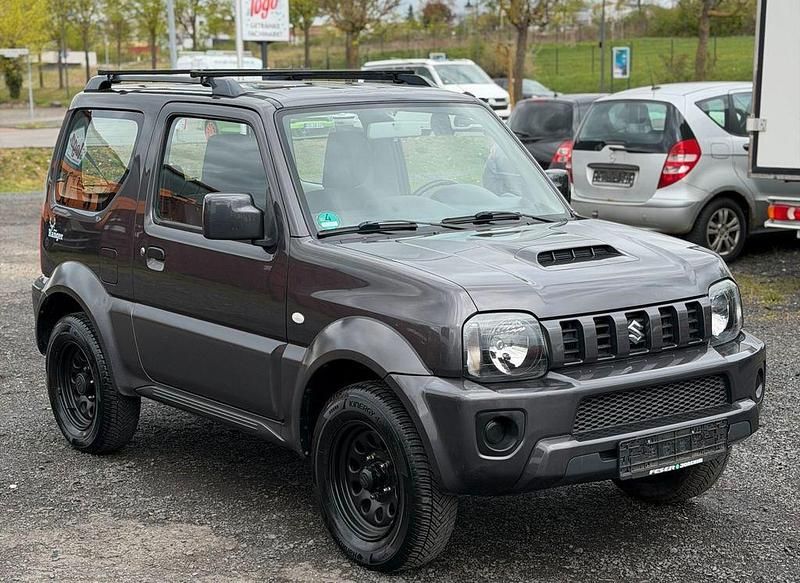 Usado Suzuki Jimny 86 HP (63 kW) 2014 Cinzento SUV