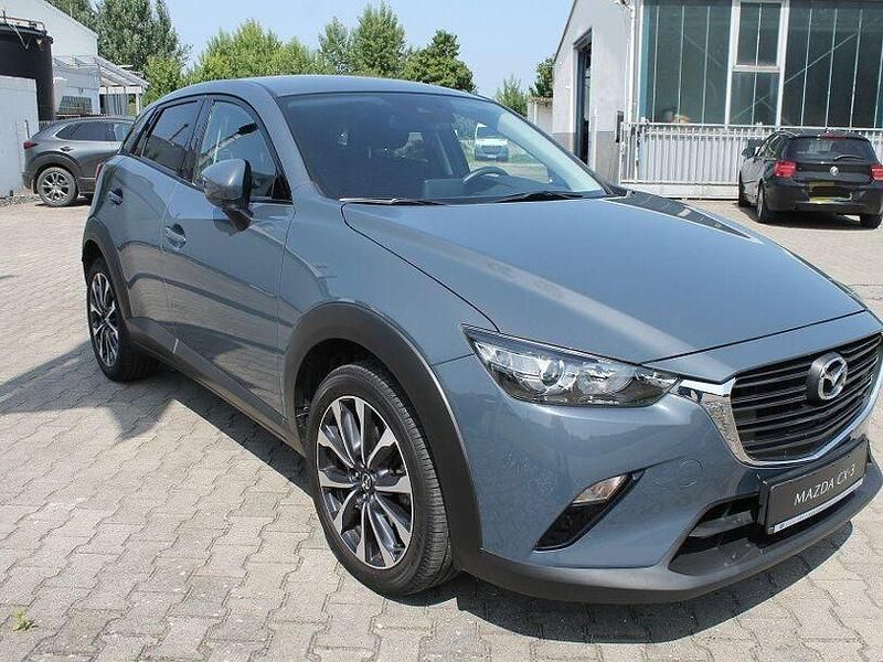 Grau Gebraucht 2021 Mazda CX-3 Ad'Vantage SUV | 17.985 € (Fairer Preis) - Bild 1/4