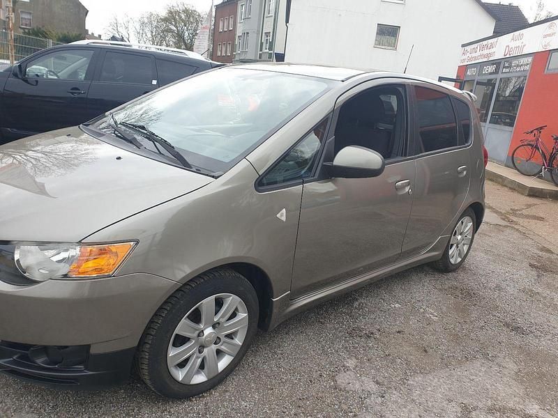 Gebraucht Mitsubishi Colt Motion 95 PS (69 kW) 2012 Grau Kleinwagen
