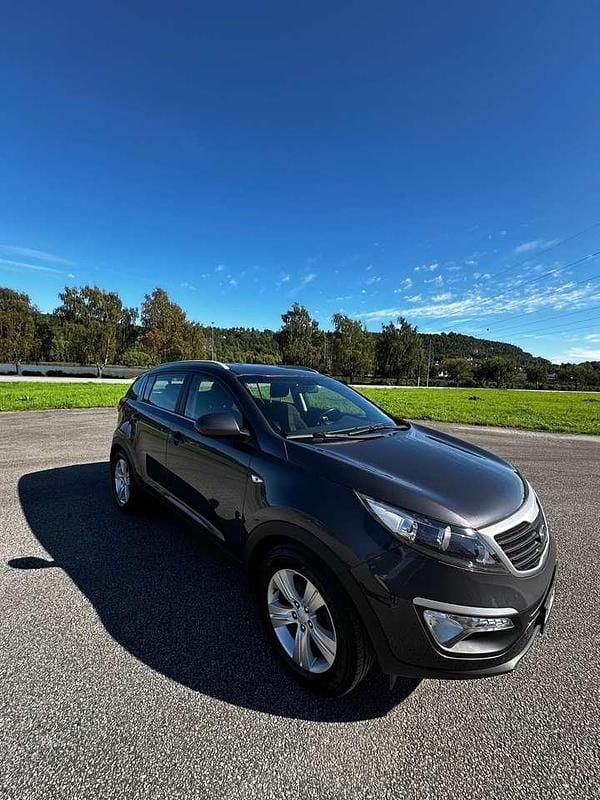Grau Gebraucht 2012 Kia Sportage Spirit SUV | 6.199 € (Superpreis) - Bild 1/4