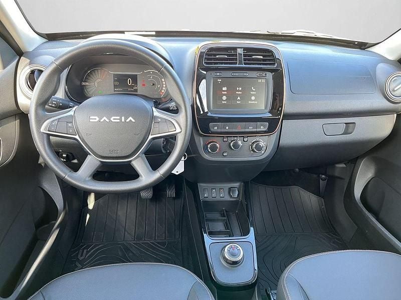 Gebraucht Dacia Spring Extreme 47 kW (65 PS) 2023 Kaolinweiß Kleinwagen