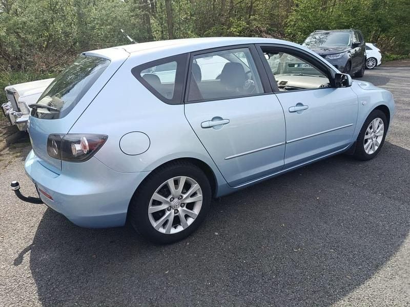 Second-hand Mazda 3 Active 105 CP (77 kW) 2008 Albastru Berlinǎ