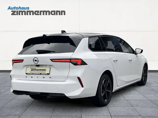 Gebraucht Opel Astra 131 PS (96 kW) 2024 Lack weiss banquise/typ aussenverkleidun Kombi