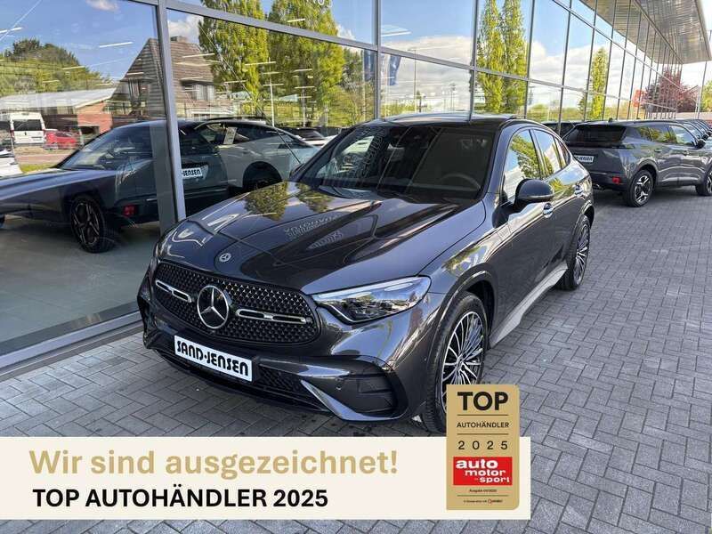 Grafitgrau metallic Gebraucht 2024 Mercedes GLC300 AMG Line Premium Plus Coupé | 69.995 € (Superpreis) - Bild 1/4