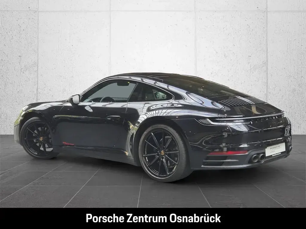Gebraucht Porsche 911 Carrera 385 PS (283 kW) 2020 Tiefschwarzmetallic Coupé