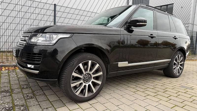 Santorini black Gebraucht 2015 Land Rover Range Rover Vogue SUV | 28.000 € (Superpreis) - Bild 1/4