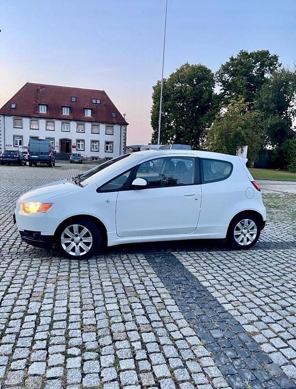 Gebraucht Mitsubishi Colt 75 PS (55 kW) 2013 Weiß Kleinwagen