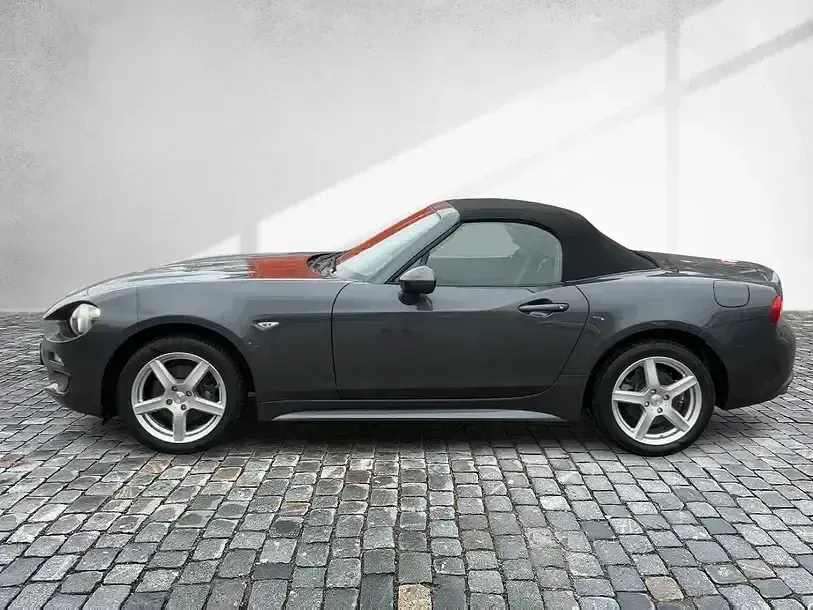 Gebraucht Fiat 124 Spider Basis 140 PS (102 kW) 2019 Colore esterno (meteor grey (metallic)) Cabrio