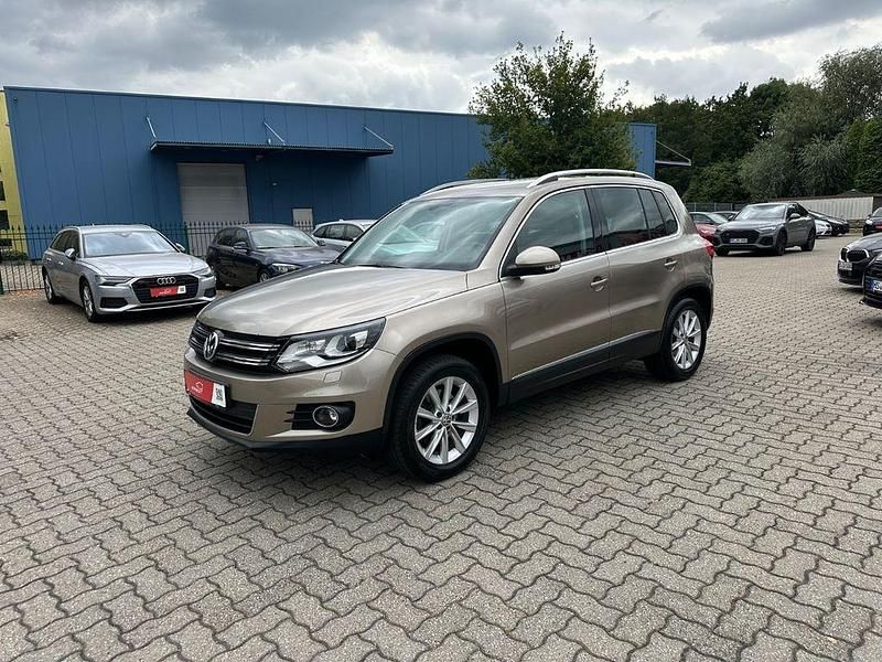 Braun Gebraucht 2012 VW Tiguan Sport SUV | 10.990 € (Fairer Preis) - Bild 1/4