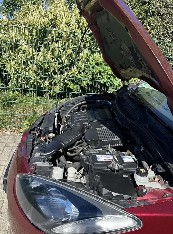 Gebraucht Mazda 2 75 PS (55 kW) 2011 Rot Kleinwagen