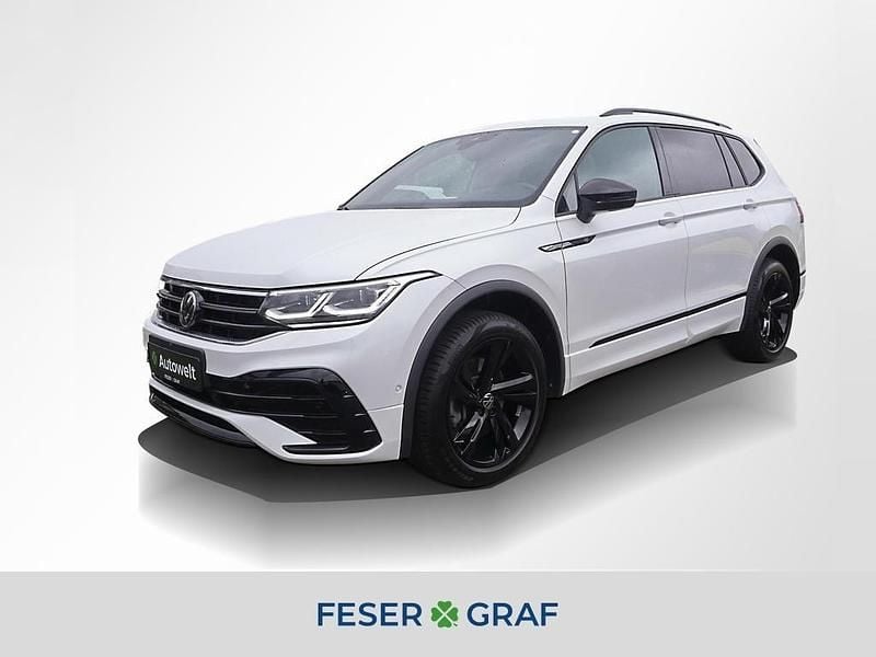 Oryxweiß perlmutteffekt Gebraucht 2024 VW Tiguan Allspace R-line SUV | 42.350 € (Fairer Preis) - Bild 1/4