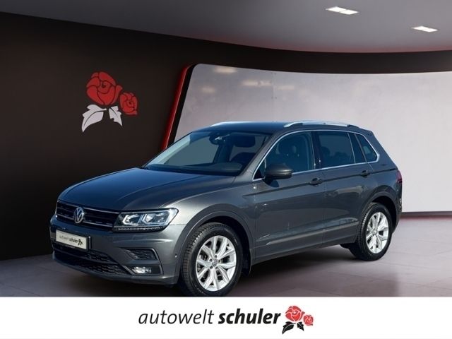 Indiumgrau metallic Gebraucht 2018 VW Tiguan Comfortline SUV | 23.949 € (Fairer Preis) - Bild 1/4