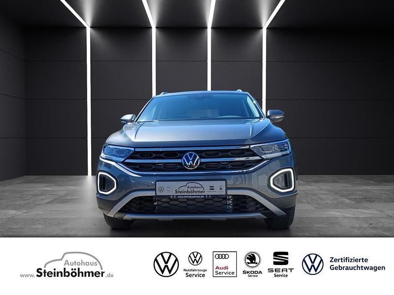 Indiumgrau (grau) Neu 2025 VW T-Roc IQ Drive SUV | 36.292 € (Fairer Preis) - Bild 1/4