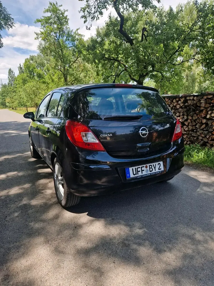 Gebraucht Opel Corsa 86 PS (63 kW) 2011 Schwarz Kleinwagen