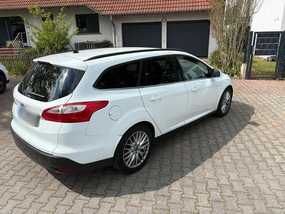 Używany Ford Focus 120 KM (88 kW) 2014 Biały Kombi