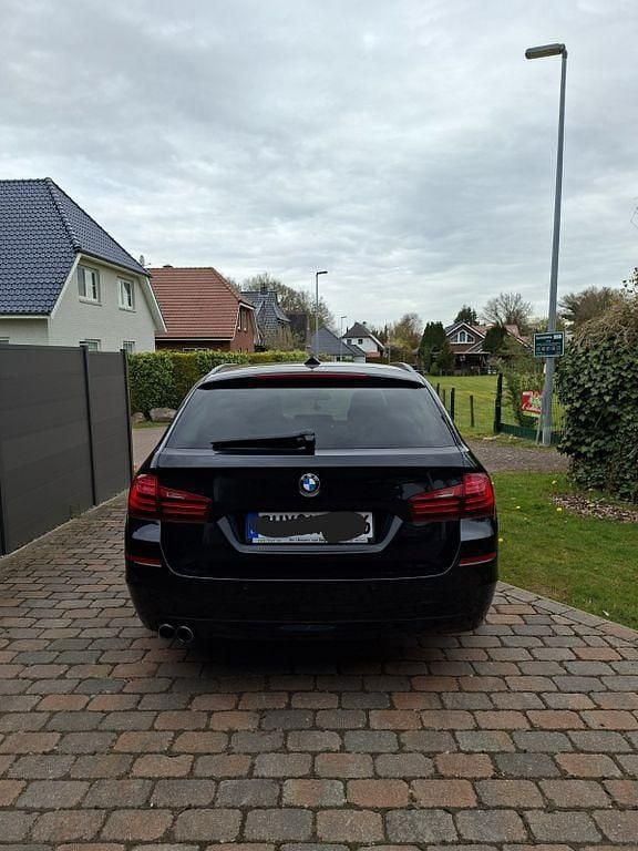 Second-hand BMW 518 150 CP (110 kW) 2016 Negru Break