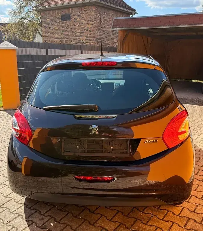 Gebraucht Peugeot 208 Active 82 PS (60 kW) 2013 Schwarz Kleinwagen
