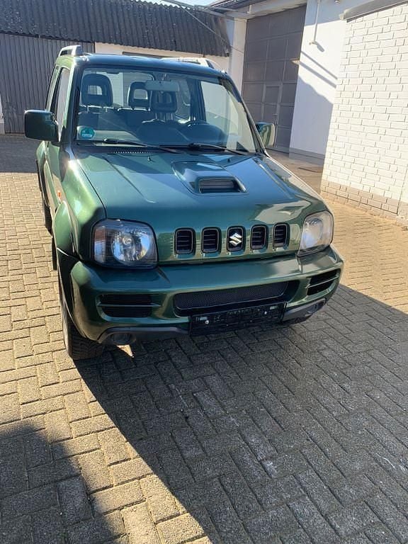 Grün Gebraucht 2010 Suzuki Jimny Comfort SUV | 5.850 € (Superpreis) - Bild 1/4