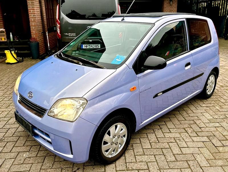 Gebraucht Daihatsu Cuore 58 PS (42 kW) 2004 Violet Kleinwagen