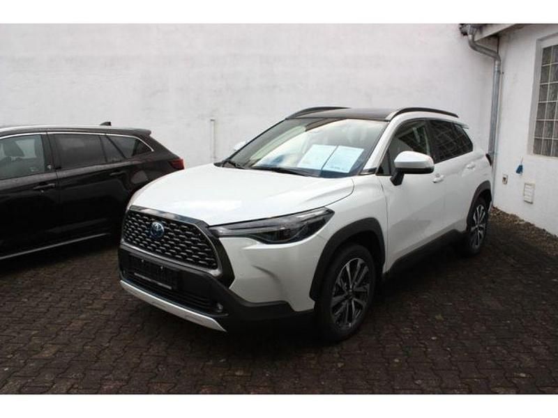 089/2ps1 platinumweiß perleffek (metallic) Gebraucht 2023 Toyota Corolla Premium SUV | 35.999 € - Bild 1/4