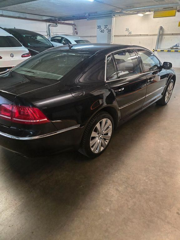 Second-hand VW Phaeton 334 CP (245 kW) 2012 Negru Berlinǎ