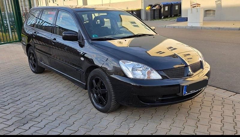 Gebraucht Mitsubishi Lancer Invite 98 PS (72 kW) 2006 Schwarz Kombi