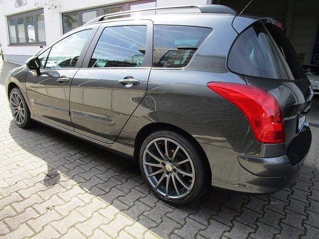 Gebraucht Peugeot 308 SW Style 114 PS (83 kW) 2014 Andere farbe metallic Kombi