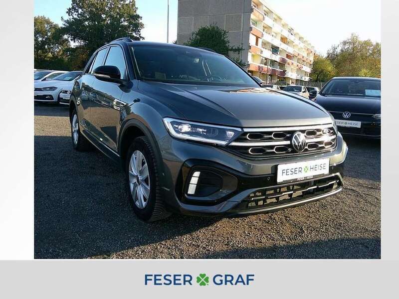 Indiumgrau metallic Gebraucht 2024 VW T-Roc R-line SUV | 28.450 € (Fairer Preis) - Bild 1/4