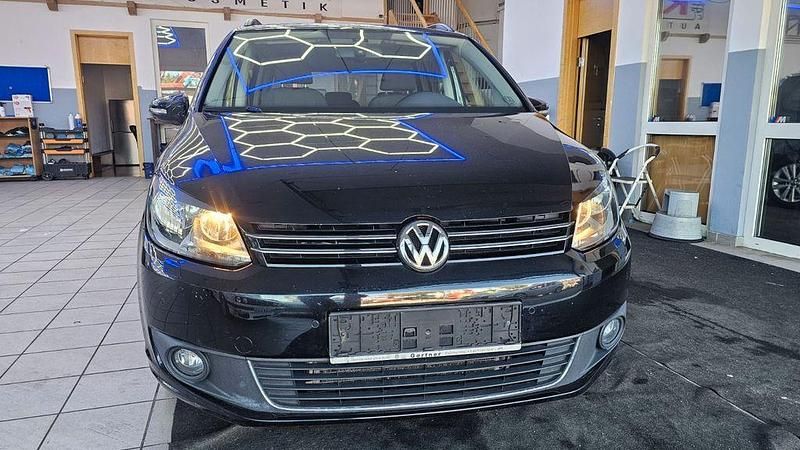 Gebraucht VW Touran Style 105 PS (77 kW) 2012 Schwarz Van / Kleinbus