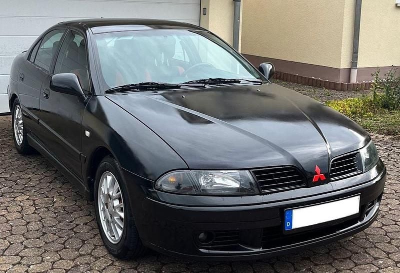 Schwarz Gebraucht 2004 Mitsubishi Carisma Limousine | 2.250 € (Fairer Preis) - Bild 1/4